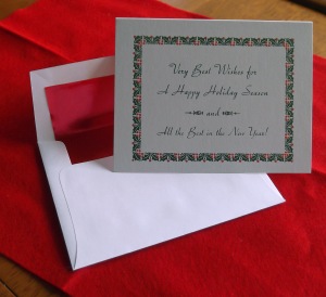Letterpress holiday greeting card in three colors (PMS 485 red, PMS 357 green and dense black--all soy-based from Southern Ink Company) with complementary red foil-lined envelope.